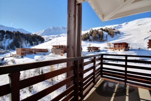 View from the SnowBadgers balcony across snowy chalets and pistes
