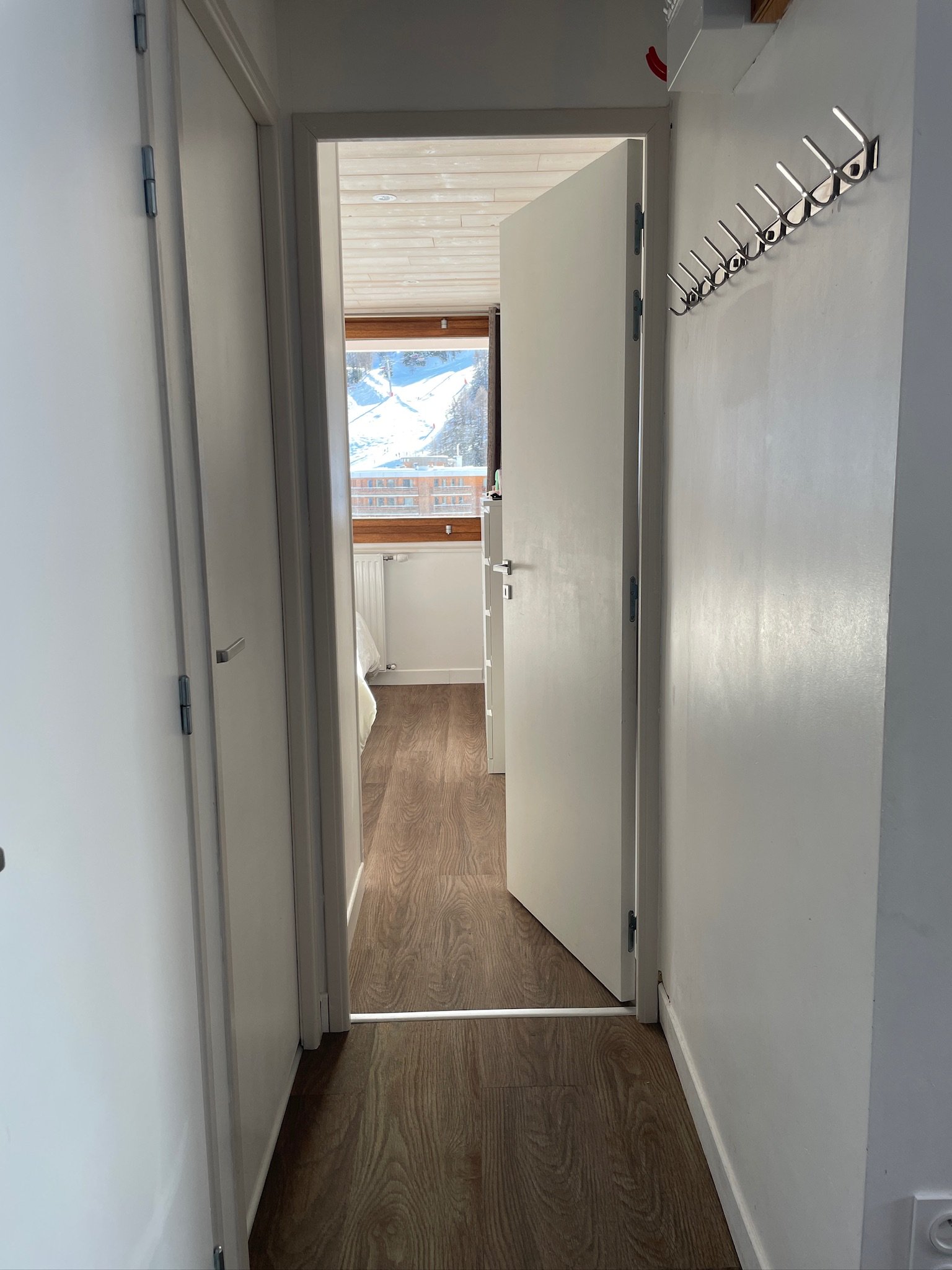 Hallway looking into a bedroom at SnowBadgers